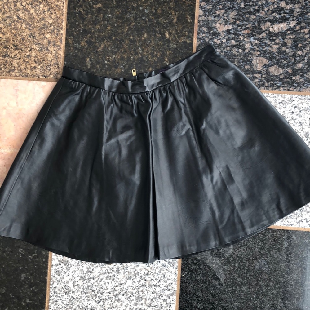 Vintage Hello kitty black vegan leather skirt size large.